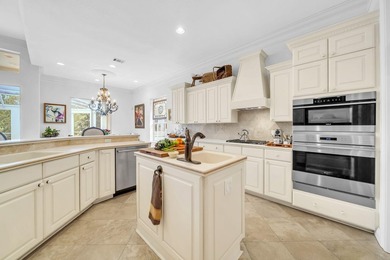 Welcome to luxury, low-maintenance living in the prestigious - photo 22