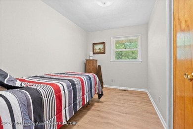 Welcome to 4089 N. Pine Dell Dr in Lansing, a well-maintained - photo 22