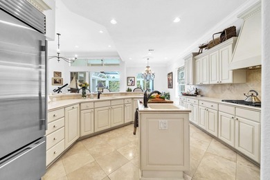 Welcome to luxury, low-maintenance living in the prestigious - photo 24