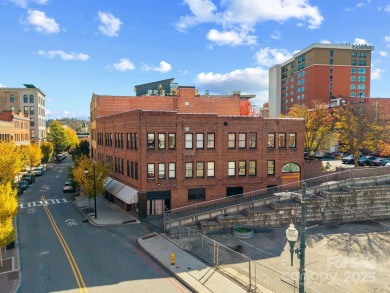 Exclusive Haywood Street Downtown Condo! Welcome to a rare