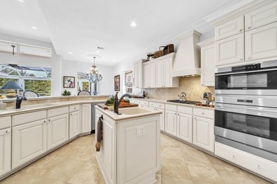 Welcome to luxury, low-maintenance living in the prestigious - photo 25