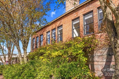 Exclusive Haywood Street Downtown Condo! Welcome to a rare