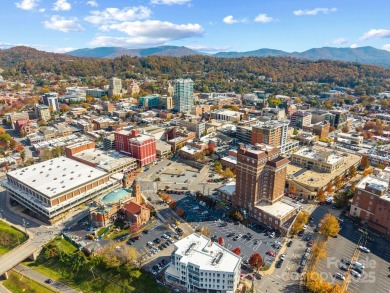 Exclusive Haywood Street Downtown Condo! Welcome to a rare