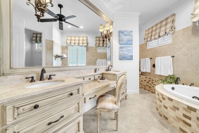 Welcome to luxury, low-maintenance living in the prestigious - photo 31