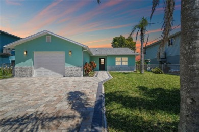 Welcome to your waterfront life; this spectacular 3 bedroom, 2 - photo 1