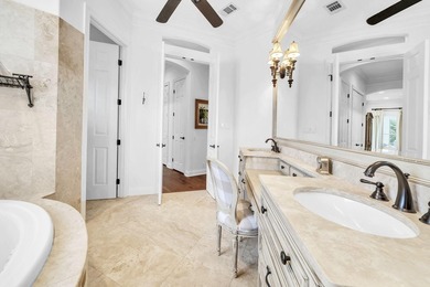 Welcome to luxury, low-maintenance living in the prestigious - photo 33