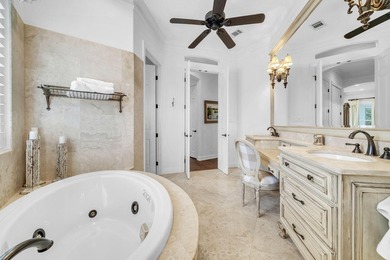 Welcome to luxury, low-maintenance living in the prestigious - photo 34