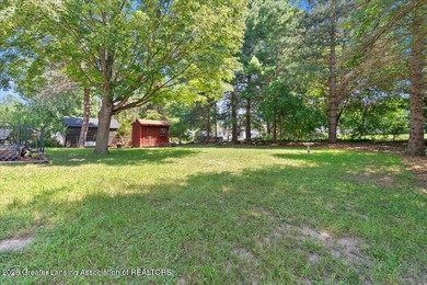 Welcome to 4089 N. Pine Dell Dr in Lansing, a well-maintained - photo 34