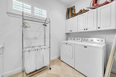 Welcome to luxury, low-maintenance living in the prestigious - photo 44