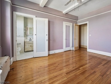 Discover the potential of this 1-bedroom residence with sweeping - photo 12