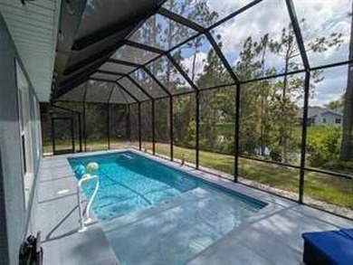Welcome to this stunning pool home that offers a perfect blend - photo 9