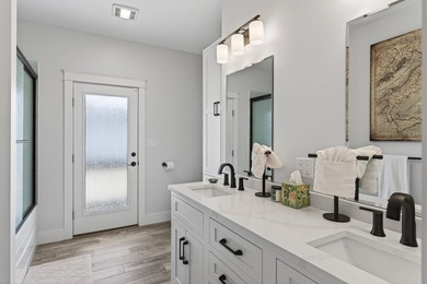 Set within an intimate four-home coastal enclave near the - photo 37