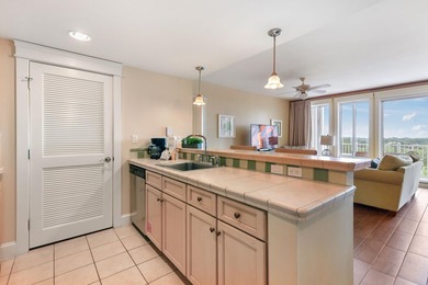 Perched on the 6th floor, this versatile condo features 2 - photo 9