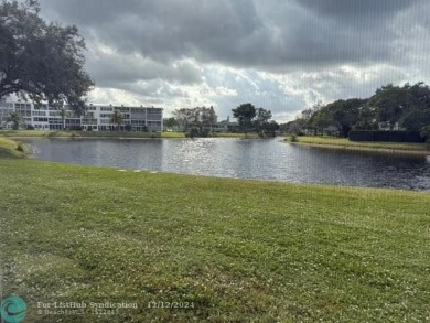 Lake Condo For Sale in Deerfield Beach, Florida