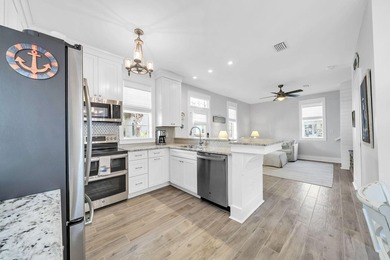 Ideally located just minutes from the sugar-white sands of the - photo 11