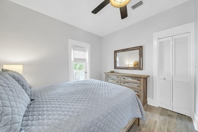 Ideally located just minutes from the sugar-white sands of the - photo 18