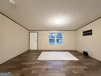 Come and check out this home minutes away from the lake at an - photo 4