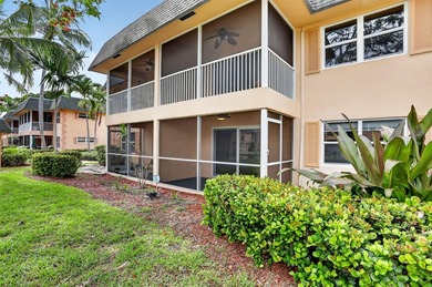 This condominium features an open kitchen, equipped with new - photo 24