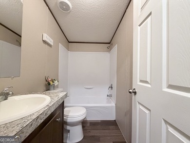 Come and check out this home minutes away from the lake at an - photo 5