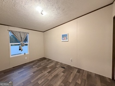 Come and check out this home minutes away from the lake at an - photo 6