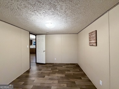 Come and check out this home minutes away from the lake at an - photo 8