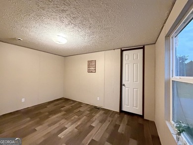 Come and check out this home minutes away from the lake at an - photo 9