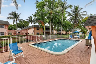 This condominium features an open kitchen, equipped with new - photo 31