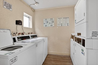 This condominium features an open kitchen, equipped with new - photo 33