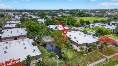 This condominium features an open kitchen, equipped with new - photo 34