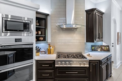 Welcome to this exquisite custom-built Carmen Homes masterpiece - photo 12