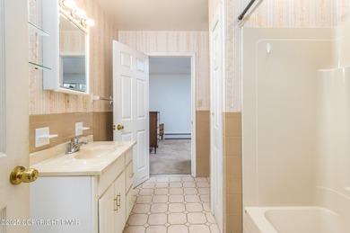 This rare single-level, Handicap accessible gem has everything: