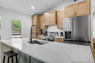 LAKE LIVING AT ITS FINEST! Spectacularly remodeled waterfront - photo 30