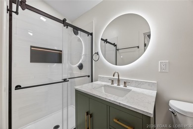 LAKE LIVING AT ITS FINEST! Spectacularly remodeled waterfront - photo 38