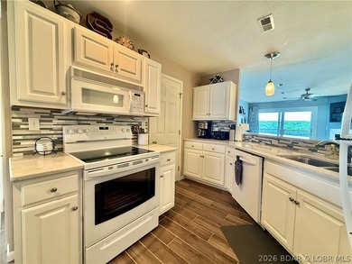 Experience lake life at its finest in this stunning condo - photo 11