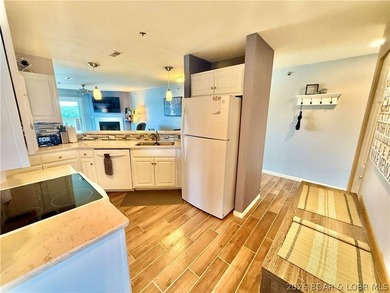 Experience lake life at its finest in this stunning condo - photo 12