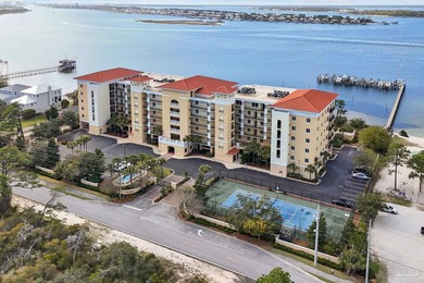 WATERFRONT END UNIT WITH DEEDED BOAT SLIP & LIFT!This spacious - photo 1