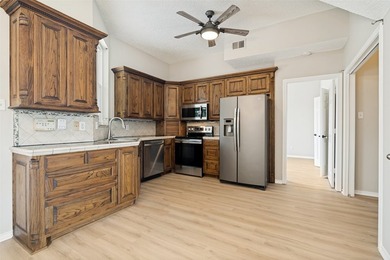 Welcome to this charming 3-bedroom, 2-bath home nestled in the - photo 12