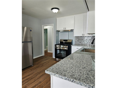 Renovated 2-bedroom, 1-bath home with a 1-car garage with brand - photo 6