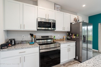 Just reduced - Your Dream Home Awaits in Bayside Lakes!This - photo 8