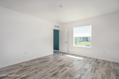 Just reduced - Your Dream Home Awaits in Bayside Lakes!This - photo 10