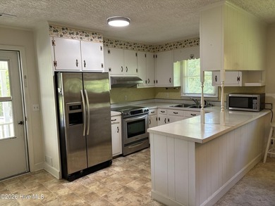 This house sits on .62 acre beautiful lot. Good size carport - photo 7