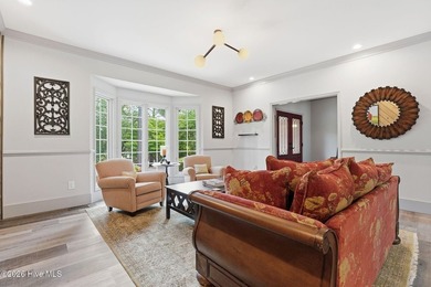 Gorgeous completely renovated home on one floor inside the gates - photo 11