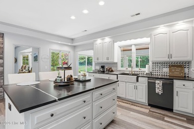 Gorgeous completely renovated home on one floor inside the gates - photo 23