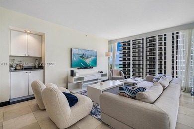 This beautiful furnished residence features an open kitchen with - photo 8