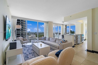 This beautiful furnished residence features an open kitchen with - photo 9