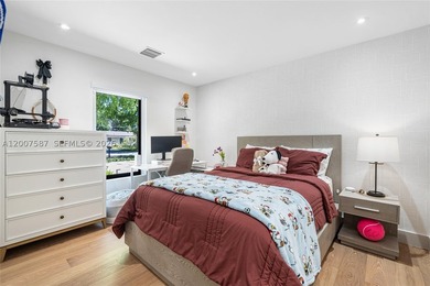 Located in Gables by the Sea, this fully renovated waterfront - photo 15