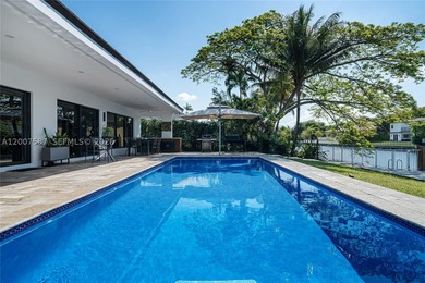 Located in Gables by the Sea, this fully renovated waterfront - photo 25