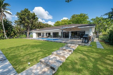 Located in Gables by the Sea, this fully renovated waterfront - photo 29
