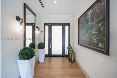 Located in Gables by the Sea, this fully renovated waterfront - photo 30