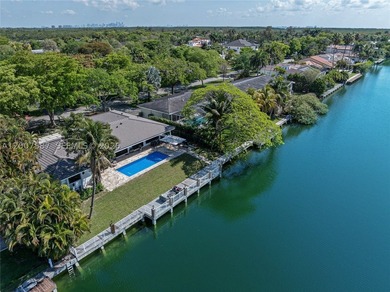Located in Gables by the Sea, this fully renovated waterfront - photo 32